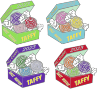 Green, aqua, purple, and red taffy boxes. Boxes are open with pieces of taffy in them.