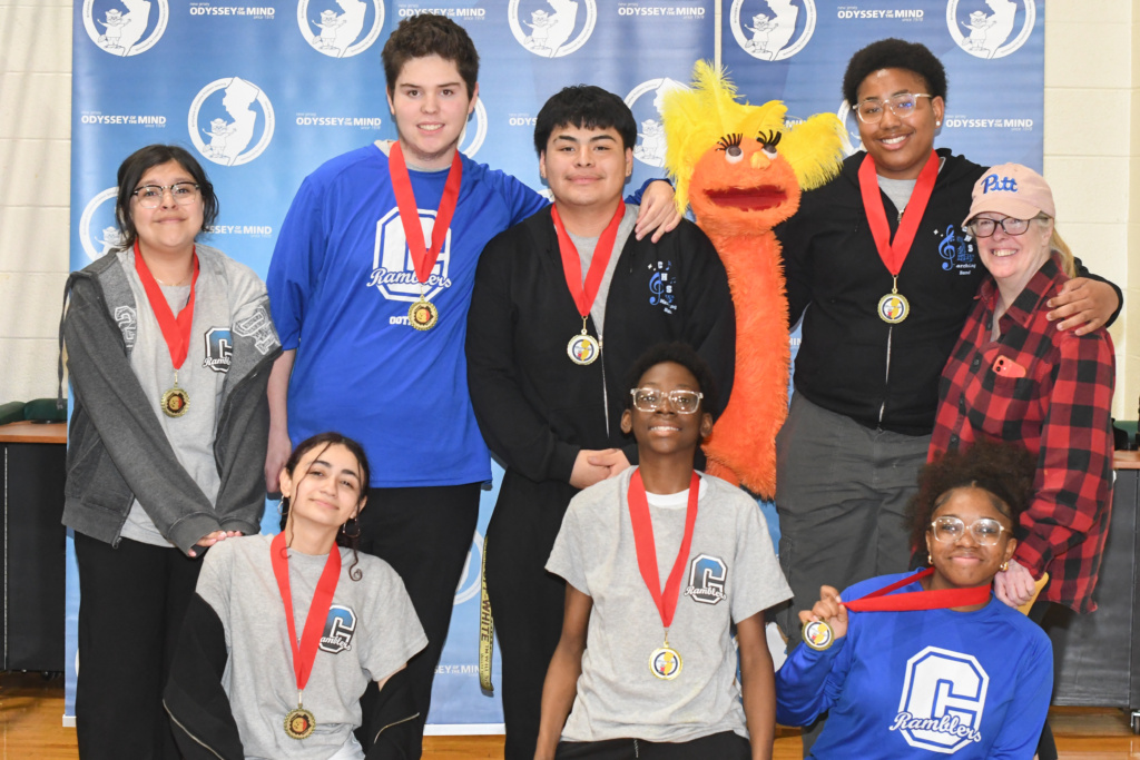 Carteret HS team wearing their red ribbon Ranata Fusca medals.