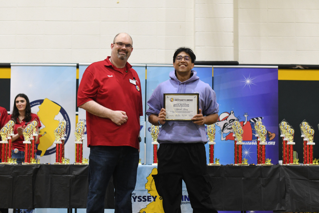 Scholarship winner, Ashvik Garg, posing with his award.