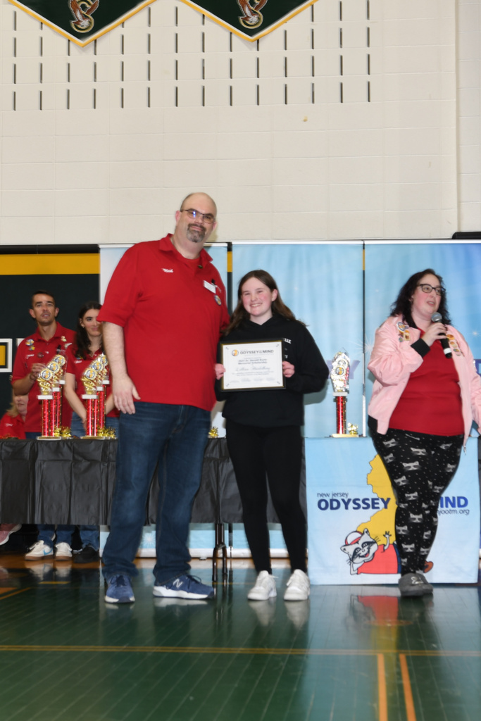 Scholarship winner Lillian Heidelberg posing with their award.