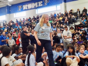 Laurie Miles walking up to receive her award.