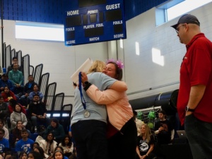 Beth Neller hugging Laurie Miles