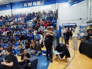 Laurie Miles and Tracey Schaum hugging at the awards ceremony.